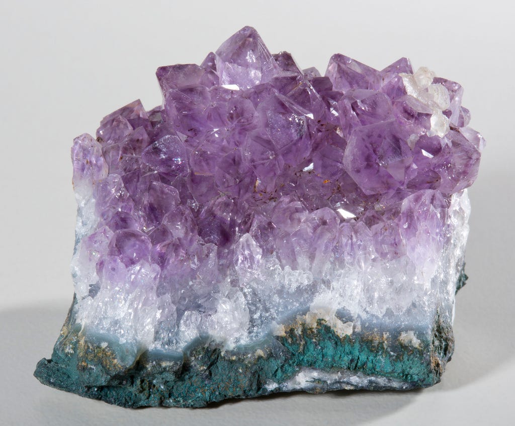 Photo of amethyst gemstone, via http://ow.ly/8Mi8300iFSD