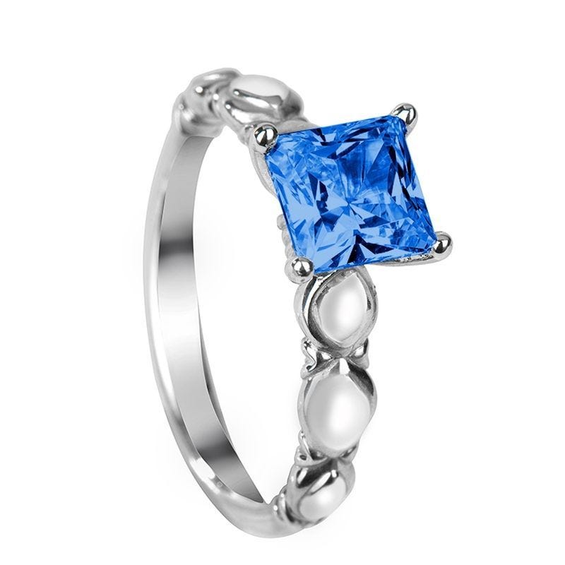 Mora - blue sapphire women's engagement ring